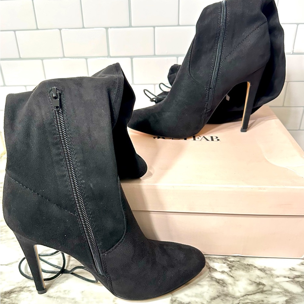 Over the Knee suede black lace tie stiletto heeled boots.